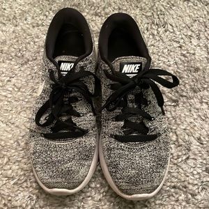 Black and white knit Nike sneakers